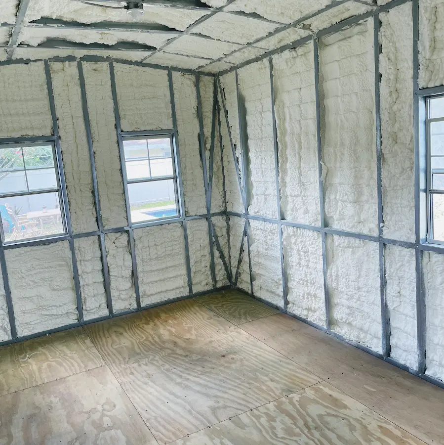 Closed-cell spray foam insulation applied to wall cavities in a residential project in Stroud